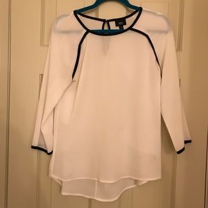 White blouse with black detail